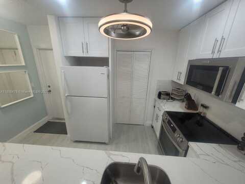300 Golden Isles Dr, Hallandale Beach, FL 33009