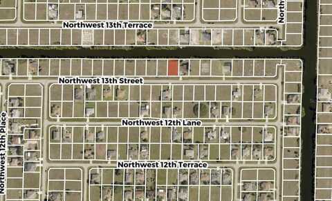 1023 NW 13TH STREET, CAPE CORAL, FL 33993