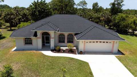 503 Poinsettia Ave., Lehigh Acres, FL 33972