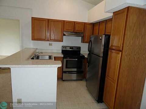 751 Lyons Rd., Coconut Creek, FL 33063