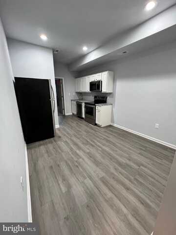1107 N FULTON AVENUE, BALTIMORE, MD 21217