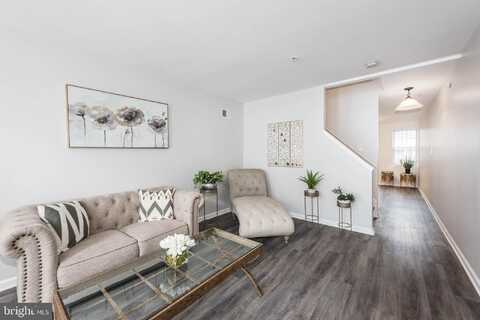 1127 N STRICKER STREET, BALTIMORE, MD 21217