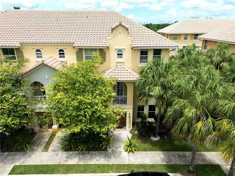 3916 Passion Flower Rd, Coconut Creek, FL 33073