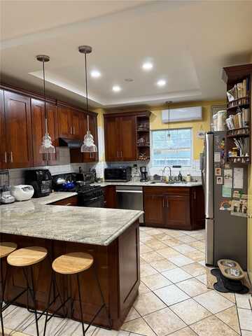 9619 95th Avenue, Ozone Park, NY 11416
