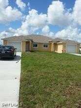 334 Grant Boulevard, Lehigh Acres, FL 33974