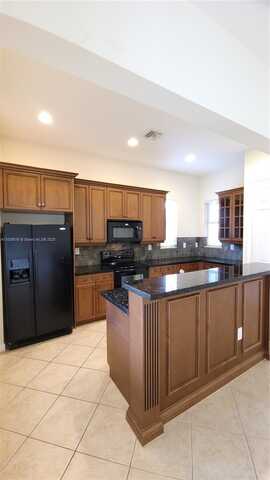 6033 NW 118th Dr, Coral Springs, FL 33076