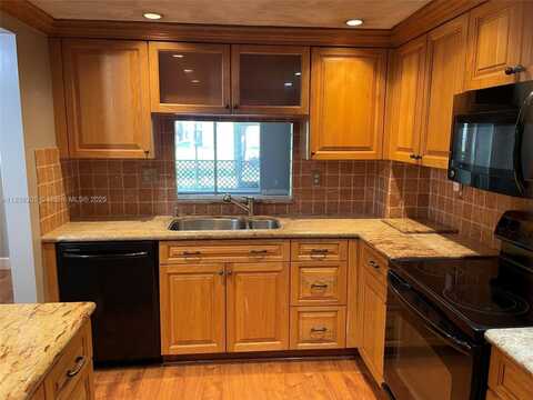8735 Ramblewood Dr, Coral Springs, FL 33071