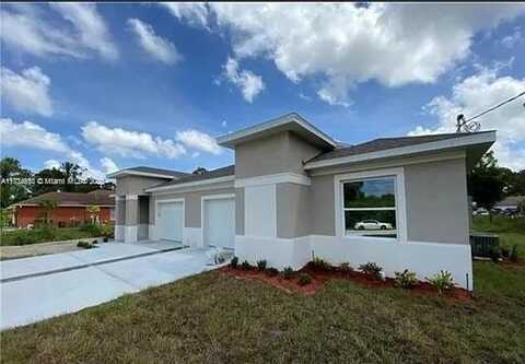 117-119 Meadow Road, Lehigh Acres, FL 33973
