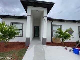 1551 Hightower Avenue S, Lehigh Acres, FL 33973