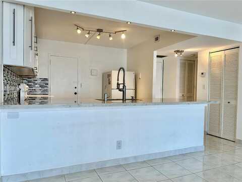 427 Golden Isles Dr, Hallandale Beach, FL 33009