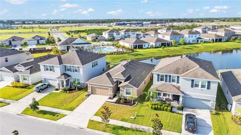144 BRIGHT IBIS AVENUE, APOLLO BEACH, FL 33572