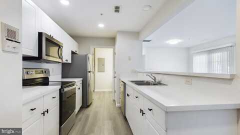 302 BAUGHMANS LANE, FREDERICK, MD 21702
