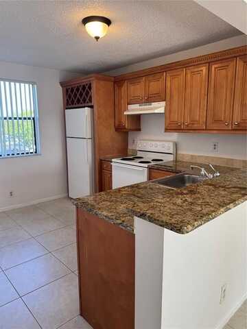 5661 Riverside Dr, Coral Springs, FL 33067