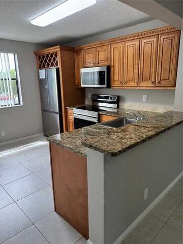 5661 Riverside Dr, Coral Springs, FL 33067