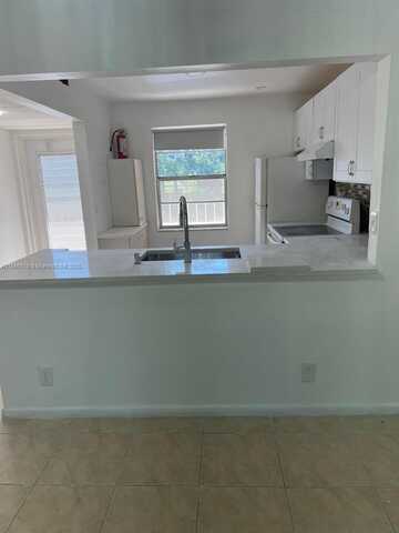 1015 Country Club Dr, Margate, FL 33063