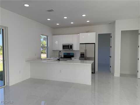 1017 Rush Avenue, Lehigh Acres, FL 33972