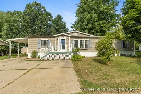 7374 Willowwood Drive NE, Belmont, MI 49306