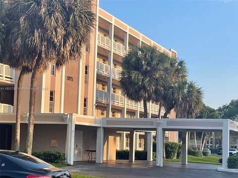 1075 Riverside Dr, Coral Springs, FL 33071