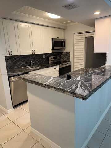 303 Racquet Club Rd, Weston, FL 33326