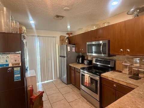 795 Crystal Lake Dr, Deerfield Beach, FL 33064