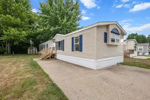 4676 GARDENS BOULEVARD NW, WALKER, MI 49534
