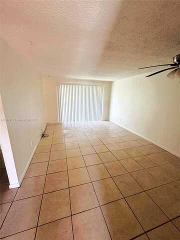 932 W Kalmia Dr, Lake Park, FL 33403