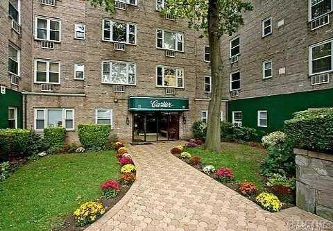 21 Bond Street, Great Neck, NY 11021