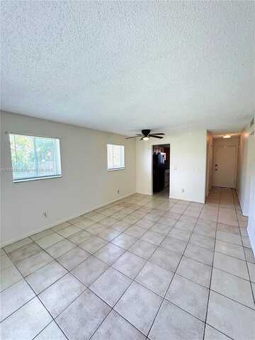 933 W Kalmia Dr, Lake Park, FL 33403