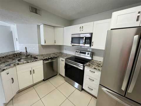 8821 Wiles Rd, Coral Springs, FL 33067