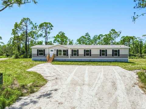7523 ACORN BOULEVARD, PUNTA GORDA, FL 33982