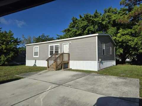 100 Lisa Lane, Greenacres, FL 33463