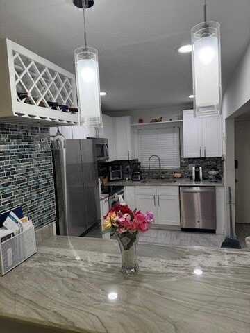 1961 Woolbright Road, Boynton Beach, FL 33426