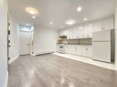 76-12 Woodside Avenue, Elmhurst, NY 11373