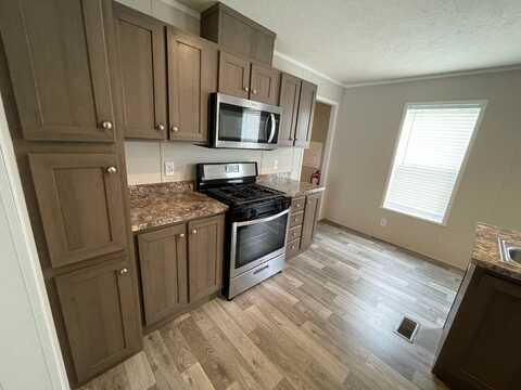 233 Maple, Highland, MI 48357