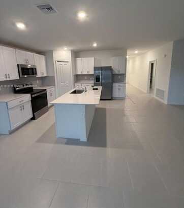 215 Peerless St, Lehigh Acres, FL 33974