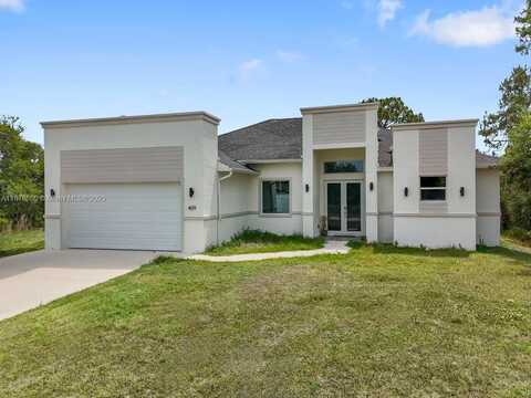 409 Columbus BLVD, Lehigh Acres, FL 33974