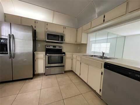 2390 Coral Springs Dr, Coral Springs, FL 33065