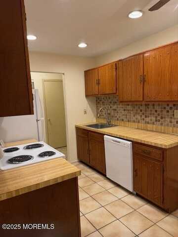 98 Arrowood Road, Manalapan, NJ 07726