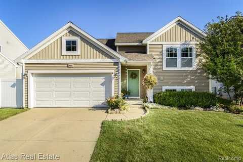 8582 Pinnebog River Drive, Fowlerville, MI 48836