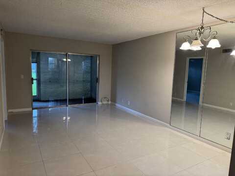 9911 Sandalfoot Boulevard, Boca Raton, FL 33428