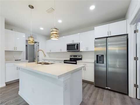 1406 Ford Circle, Lehigh Acres, FL 33936