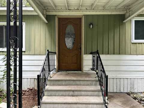7115 Clinton Avenue, Carp Lake, MI 49718