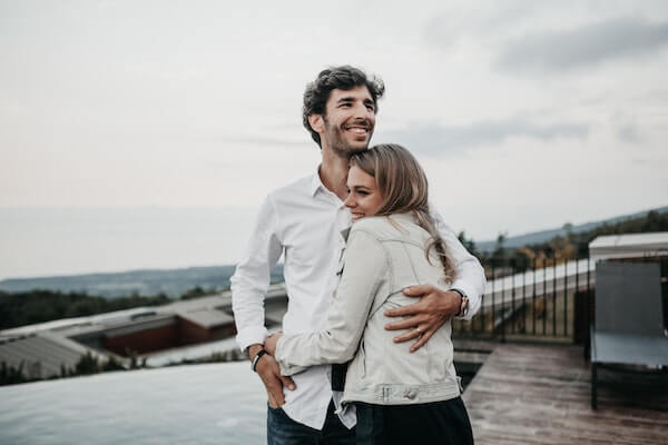 man and woman embracing