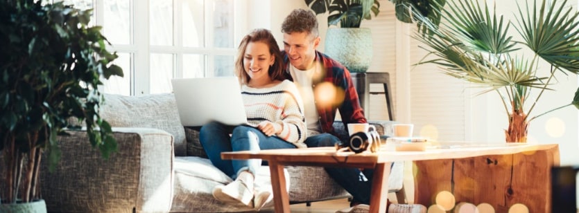 couple looking at foreclosures in their area